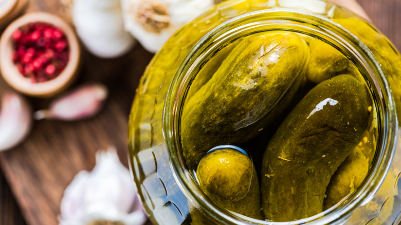 Opened jar of pickles