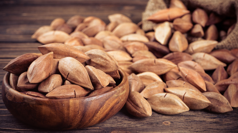 Wooden bowl of pili nuts