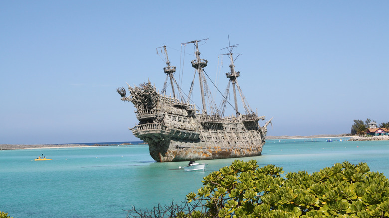 Old pirate ship in clear blue water