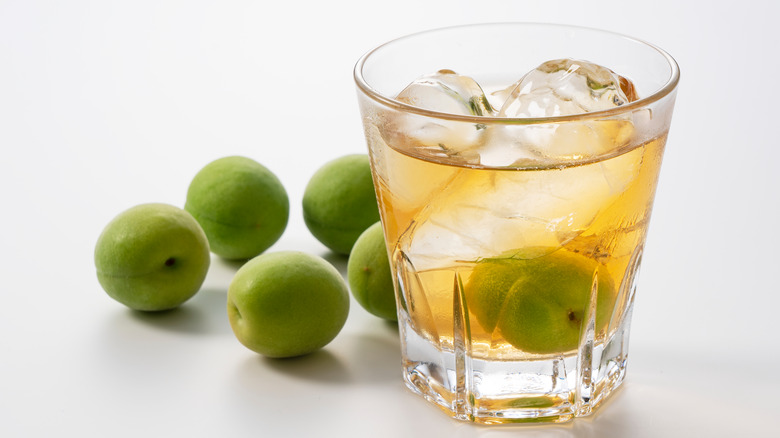 Glass of umeshu with Japanese plums