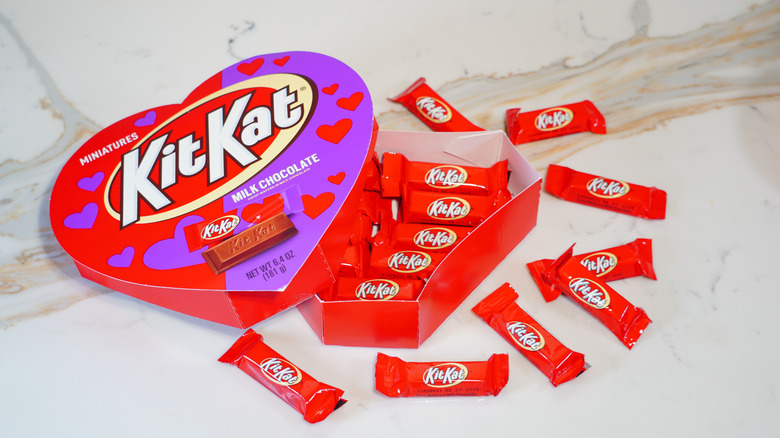An open heart-shaped box of Kit Kats