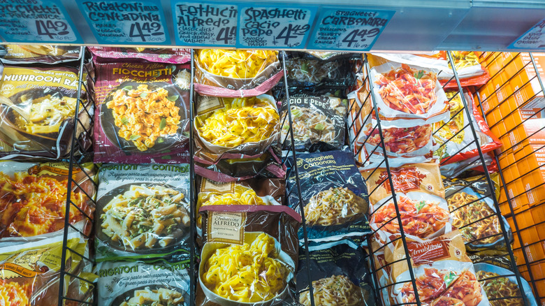 A selection of frozen meals from Trader Joe's in the frozen food aisle