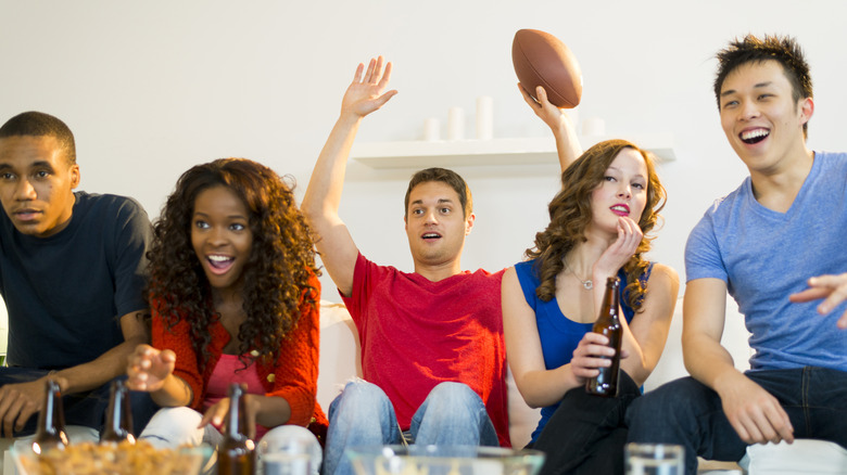 people enjoying Super Bowl party