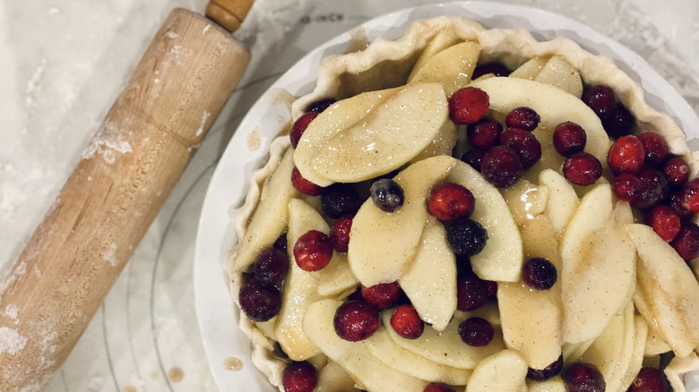 Unbaked apple and cranberry pie 