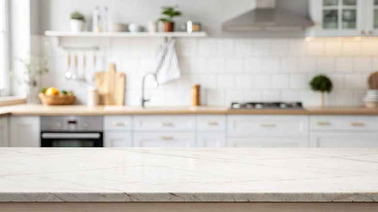 a kitchen island made with a stone countertop