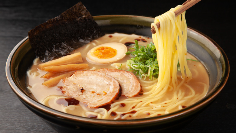 Bowl of noodle soup with chopsticks