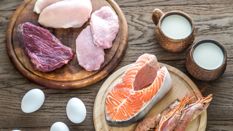 Raw meats on cutting boards