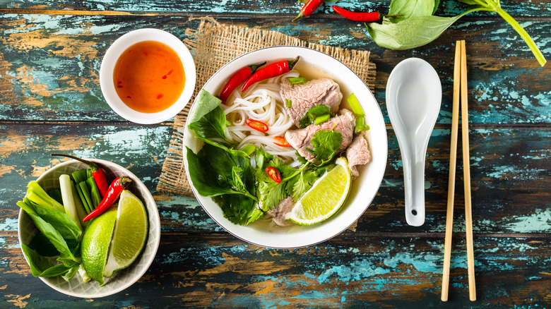 Bowl of pho with toppings