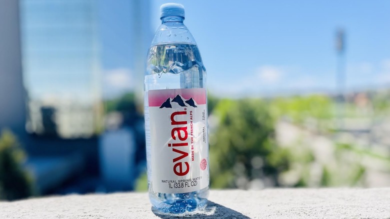 Bottle of Evian water on outdoor ledge