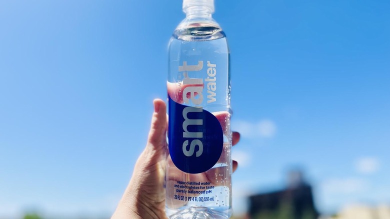 Hand holding bottle of Smartwater
