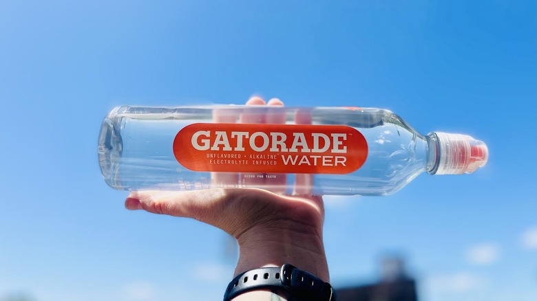 Hand holding bottle of Gatorade Water