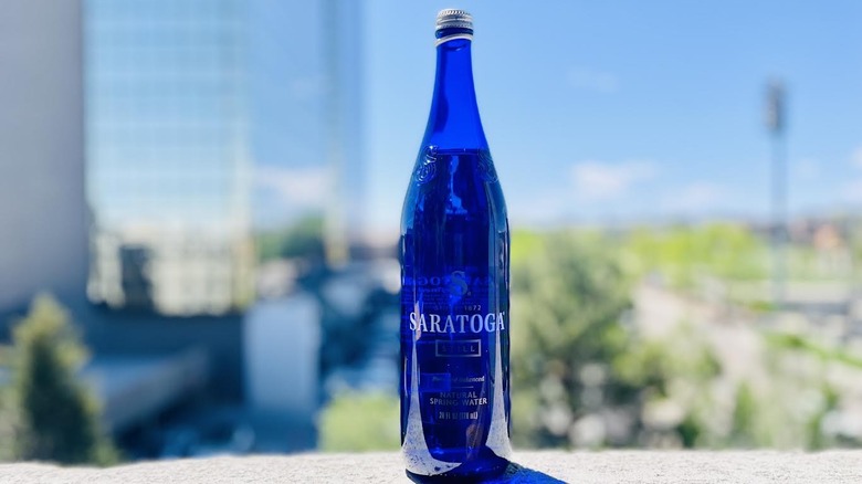 Bottle of Saratoga water on outdoor ledge