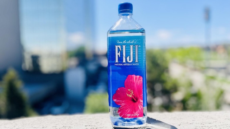 Bottle of Fiji water on outdoor ledge