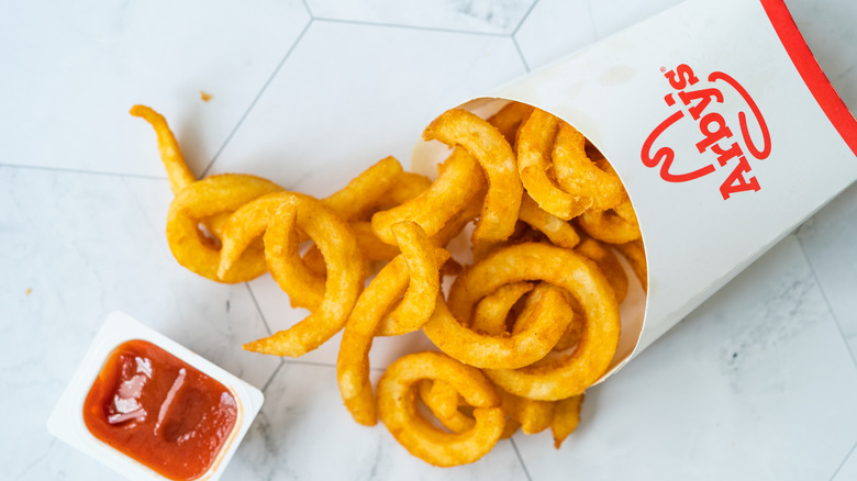 Arby's curly fries and sauce