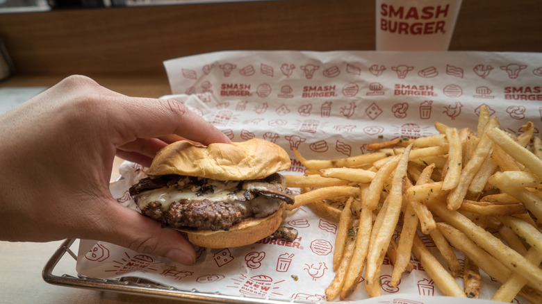 A Smashburger meal, a burger, fries and a drink