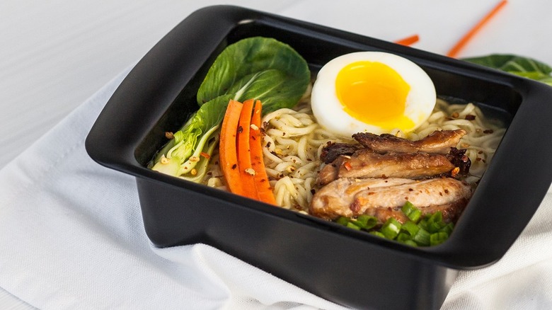 Black Rapid Ramen Cooker with noodles and veggies