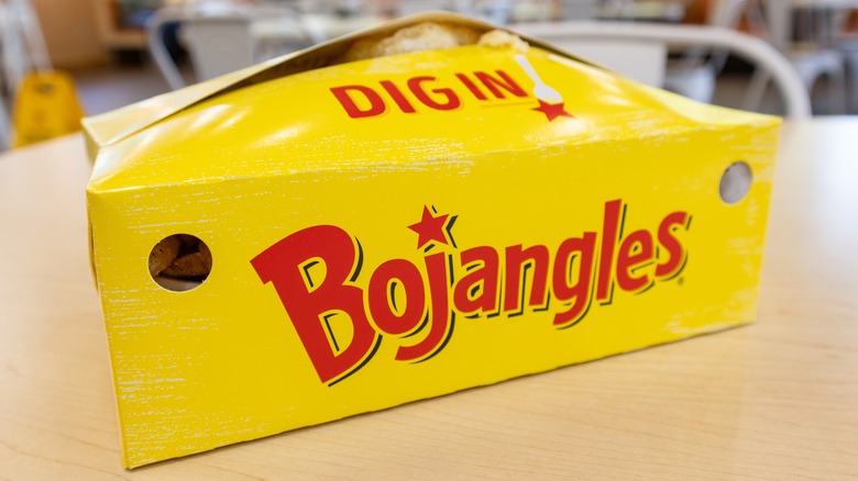 Closeup of a Bojangles food container sitting on a restaurant tabletop