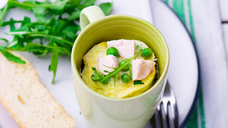 omelet in mug with vegetables