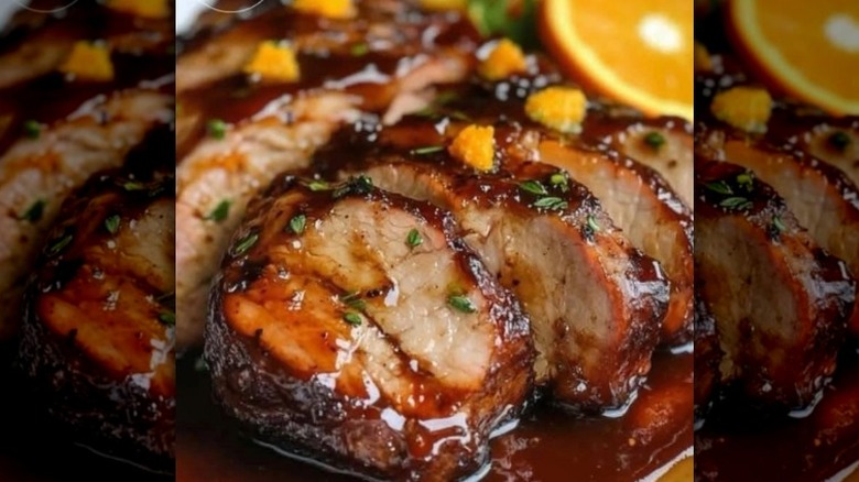 Sliced pork is covered with Florida Citrus barbecue sauce