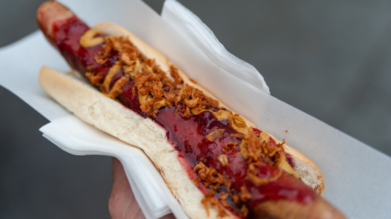 Reindeer sausage on a bun with onions