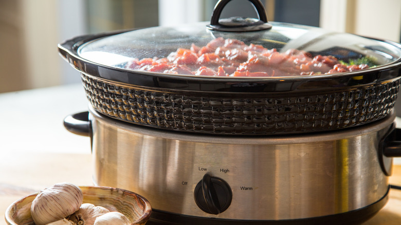 slow cooker with stew cooking 