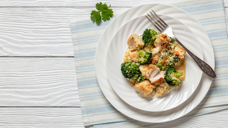 Chicken Divan on white plate with fork