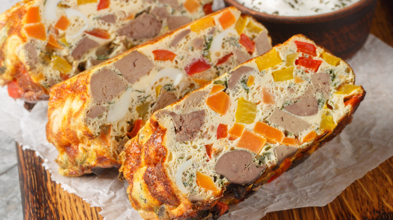 Chicken terrine with chicken liver, carrots, and peppers