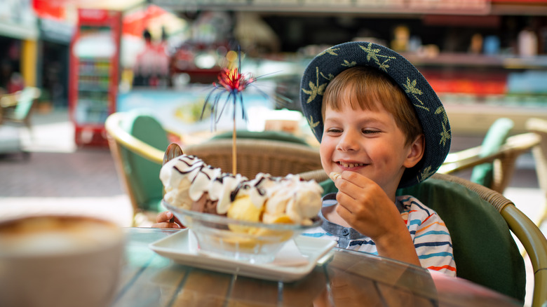 Boy enjoying a banana split