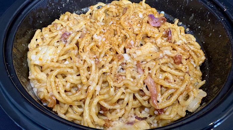 bowl of carbonara ramen with black background