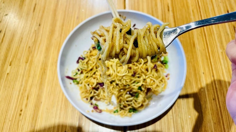 Chili Garlic Ramen noodles wound around a fork
