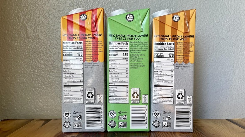 Nutritional information on cartons of Oatly oat milk in various flavors