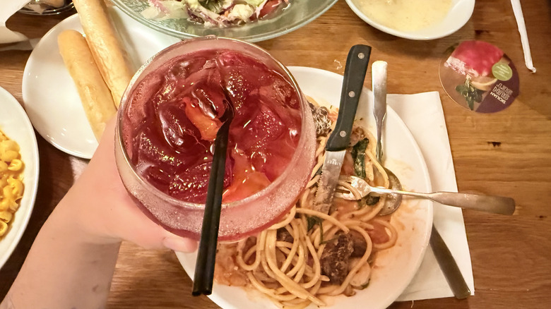 Glass of sangria in front of food