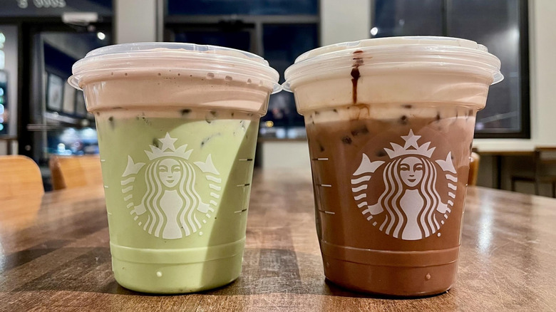 Starbucks new Dubai Chocolate drinks on wooden table inside store