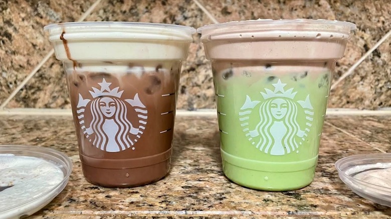 Starbucks new iced Dubai Chocolate drinks on a marble counter