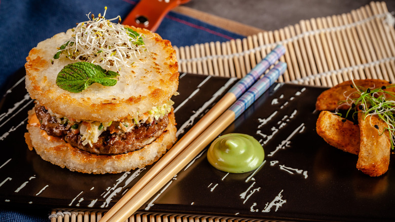 Crispy rice burger with chopsticks
