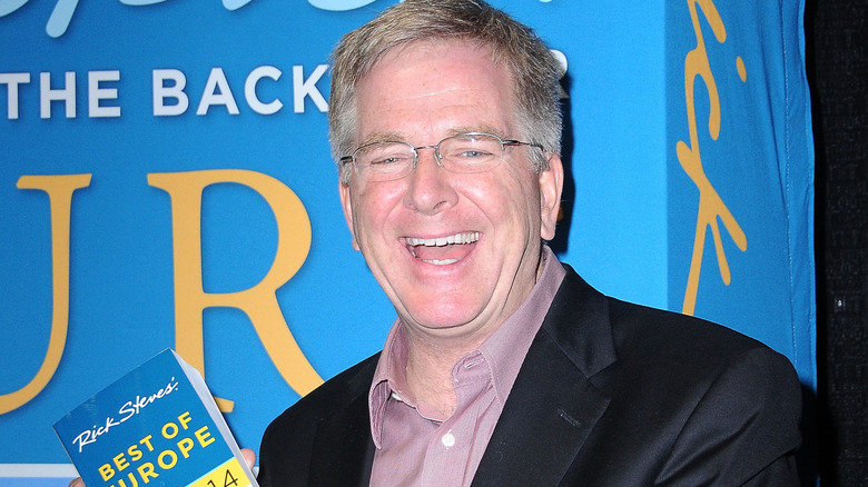 Rick Steves smiling at an event.
