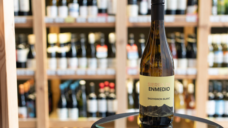 Sauvignon blanc bottle in wine store.
