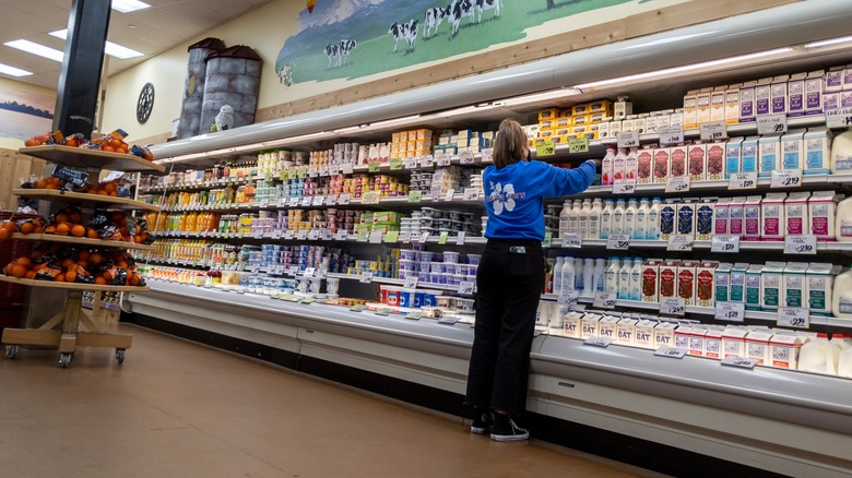 Trader Joe's employee in dairy aisle