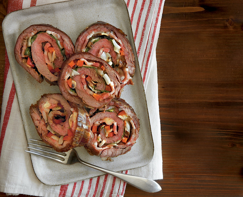 Flank steak recipes are alright. But stuffed flank steak recipes involve stuffing. And if you know us, that means bacon and cheese..