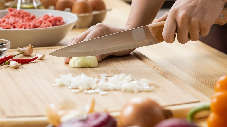 chopped onion on cutting board