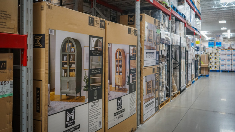 Boxes of furniture sit on shelves in a Sam's Club