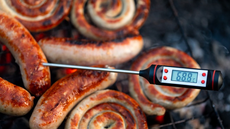 meat thermometer in sausage