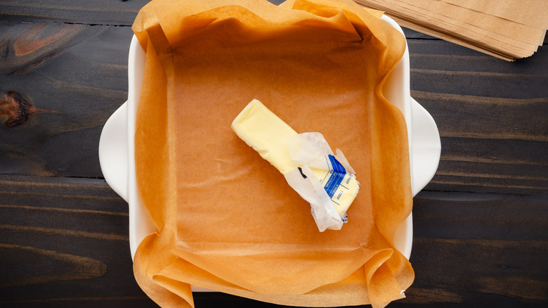parchment paper pan with butter