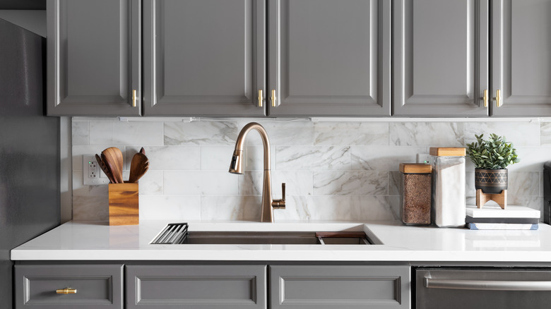 Kitchen with gray painted cabinets
