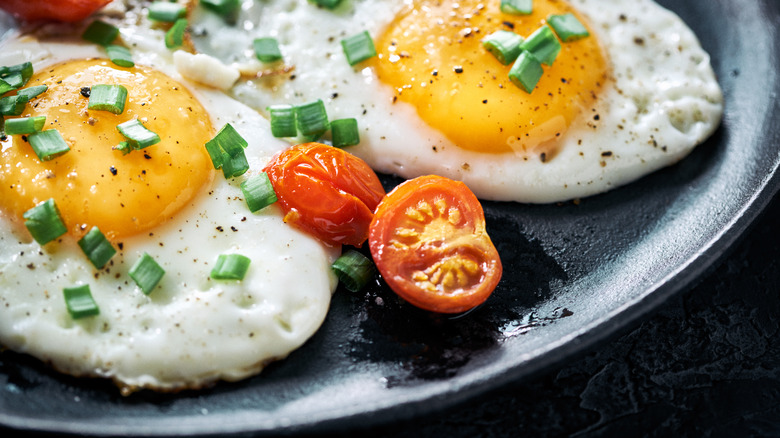 fried eggs and tomatoes
