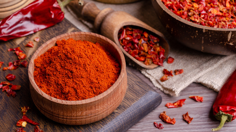 Wooden bowl of chili powder