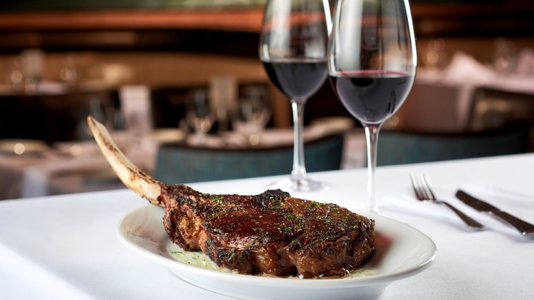 Ruth's Chris steak cut open with fork and butter