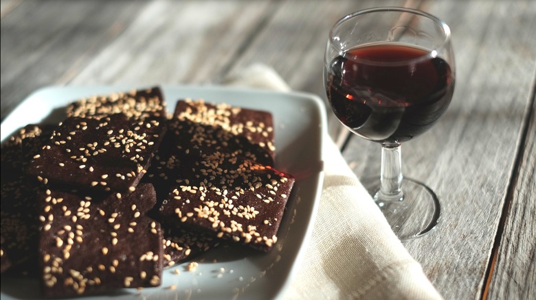 sesame brownies and glass of red wine
