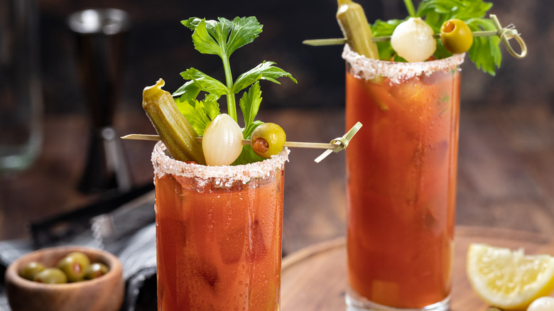 Bloody Mary cocktails with lots of garnishes and salted rims