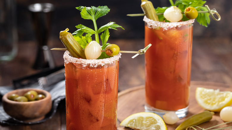 Bloody Mary cocktails with lots of garnishes and salted rims